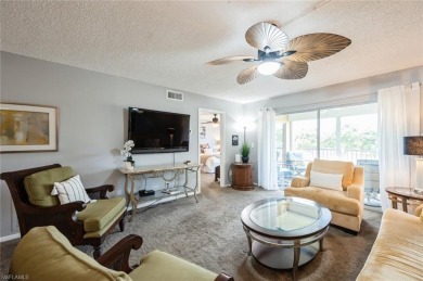Paradise awaits you this second floor, 2 bed, 2 bath with on Royal Palm Golf Club in Florida - for sale on GolfHomes.com, golf home, golf lot