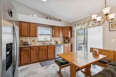 Curb appeal sets the tone as you arrive at this lovely pool home on Countryway Golf Course in Florida - for sale on GolfHomes.com, golf home, golf lot