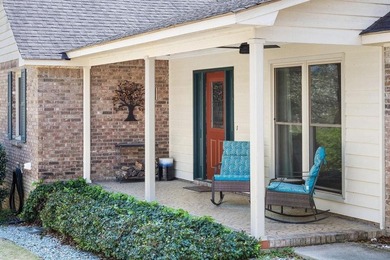 Relax on your front porch while overlooking Lakewood Golf Course on Lakewood Golf Course in Alabama - for sale on GolfHomes.com, golf home, golf lot