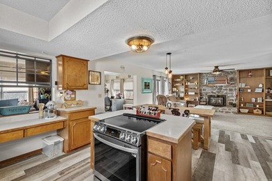 Your lake home awaits! This well-maintained home is situated on on Indian Hills Country Club in Arkansas - for sale on GolfHomes.com, golf home, golf lot