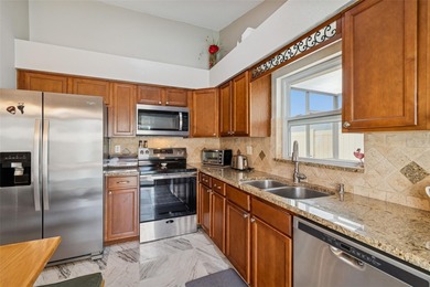 Curb appeal sets the tone as you arrive at this lovely pool home on Countryway Golf Course in Florida - for sale on GolfHomes.com, golf home, golf lot