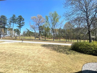 Relax on your front porch while overlooking Lakewood Golf Course on Lakewood Golf Course in Alabama - for sale on GolfHomes.com, golf home, golf lot