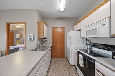 Welcome home to this beautifully updated condo in the heart of on St. Andrews Golf Club in Iowa - for sale on GolfHomes.com, golf home, golf lot
