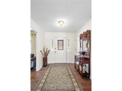 Relax on your front porch while overlooking Lakewood Golf Course on Lakewood Golf Course in Alabama - for sale on GolfHomes.com, golf home, golf lot