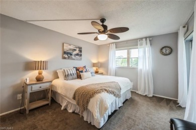 Paradise awaits you this second floor, 2 bed, 2 bath with on Royal Palm Golf Club in Florida - for sale on GolfHomes.com, golf home, golf lot