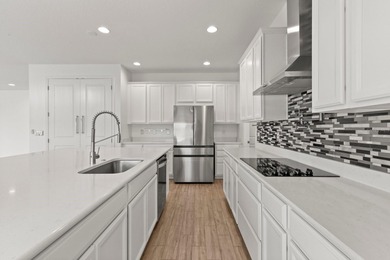 Welcome to 17708 Sawgrass Run, a stunning 2023-built luxury home on Deer Island Country Club in Florida - for sale on GolfHomes.com, golf home, golf lot