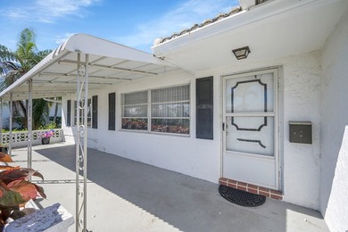 Lovely Corner Leisureville Home (55+) located just east of on Leisureville Community Golf Course in Florida - for sale on GolfHomes.com, golf home, golf lot