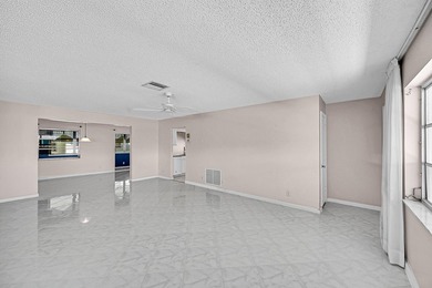 Lovely Corner Leisureville Home (55+) located just east of on Leisureville Community Golf Course in Florida - for sale on GolfHomes.com, golf home, golf lot