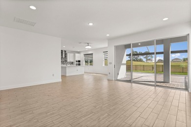 Welcome to 17708 Sawgrass Run, a stunning 2023-built luxury home on Deer Island Country Club in Florida - for sale on GolfHomes.com, golf home, golf lot