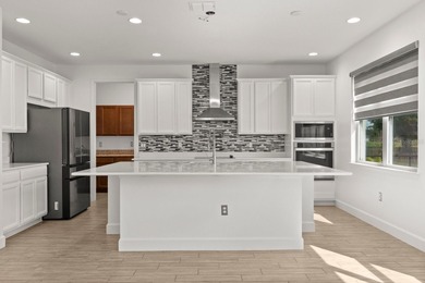 Welcome to 17708 Sawgrass Run, a stunning 2023-built luxury home on Deer Island Country Club in Florida - for sale on GolfHomes.com, golf home, golf lot