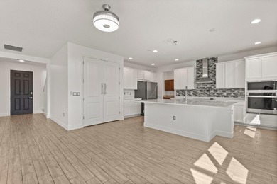 Welcome to 17708 Sawgrass Run, a stunning 2023-built luxury home on Deer Island Country Club in Florida - for sale on GolfHomes.com, golf home, golf lot