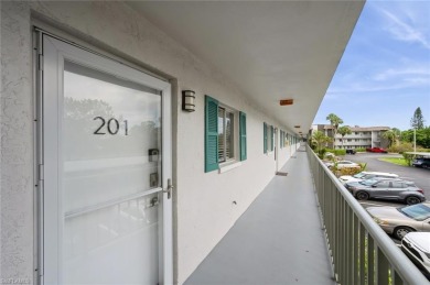 Paradise awaits you this second floor, 2 bed, 2 bath with on Royal Palm Golf Club in Florida - for sale on GolfHomes.com, golf home, golf lot