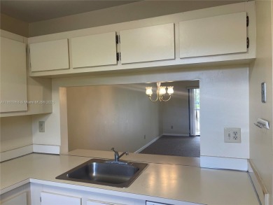 Discover serene living in this charming 2 bed, 2 bath condo on Pembroke Lakes Golf Club in Florida - for sale on GolfHomes.com, golf home, golf lot