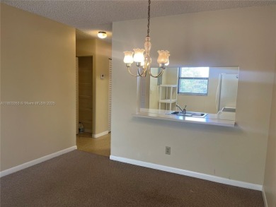 Discover serene living in this charming 2 bed, 2 bath condo on Pembroke Lakes Golf Club in Florida - for sale on GolfHomes.com, golf home, golf lot