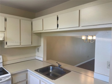 Discover serene living in this charming 2 bed, 2 bath condo on Pembroke Lakes Golf Club in Florida - for sale on GolfHomes.com, golf home, golf lot