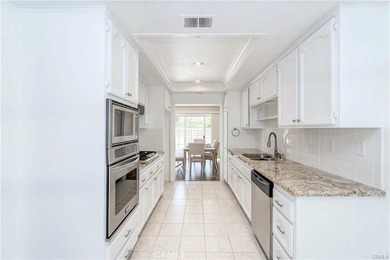 Welcome to this beautifully updated home nestled in the heart of on Bixby Village Golf Course in California - for sale on GolfHomes.com, golf home, golf lot