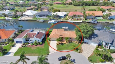 Gulf access pool home with 10,000 lb. boat lift, NO FLOODING! on Saint Andrews South Golf Club in Florida - for sale on GolfHomes.com, golf home, golf lot