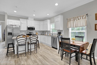 Truly a BOATER'S PARADISE -park your boat, jet-ski in your yard on Brick Landing Plantation Yacht and Golf Club in North Carolina - for sale on GolfHomes.com, golf home, golf lot