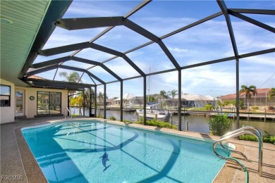 Gulf access pool home with 10,000 lb. boat lift, NO FLOODING! on Saint Andrews South Golf Club in Florida - for sale on GolfHomes.com, golf home, golf lot