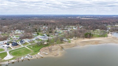 This fantastic property located in Craig Beach Village is in a on Olde Dutch Mill Golf Course in Ohio - for sale on GolfHomes.com, golf home, golf lot