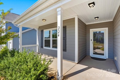 Discover the perfect family home at 224 Old Harbor Drive in on The Tillery Tradition Country Club in North Carolina - for sale on GolfHomes.com, golf home, golf lot