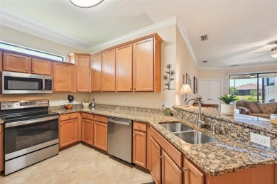 Your vacation doesn't have to end! This 2 BR & Den, 2 BA, 2-car on Plantation Golf and Country Club in Florida - for sale on GolfHomes.com, golf home, golf lot