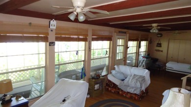 BREATHE-TAKING VIEWS OVERLOOKING TOLEDO BEND LAKE, LOCATED on Cypress Bend Golf Course in Texas - for sale on GolfHomes.com, golf home, golf lot