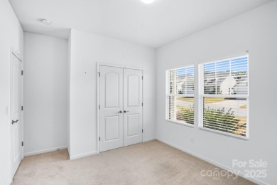 Discover the perfect family home at 224 Old Harbor Drive in on The Tillery Tradition Country Club in North Carolina - for sale on GolfHomes.com, golf home, golf lot