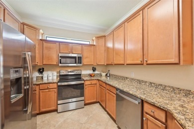 Your vacation doesn't have to end! This 2 BR & Den, 2 BA, 2-car on Plantation Golf and Country Club in Florida - for sale on GolfHomes.com, golf home, golf lot