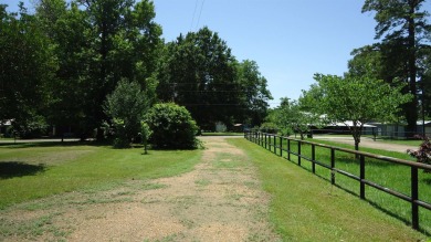 BREATHE-TAKING VIEWS OVERLOOKING TOLEDO BEND LAKE, LOCATED on Cypress Bend Golf Course in Texas - for sale on GolfHomes.com, golf home, golf lot