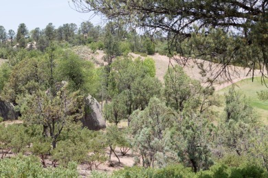 Build your dream home and enjoy the beautiful wooded on The Rim Golf Club in Arizona - for sale on GolfHomes.com, golf home, golf lot