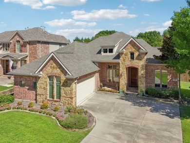 This BEAUTY is nestled on a spacious third-acre lot with a on The Shores Country Club in Texas - for sale on GolfHomes.com, golf home, golf lot