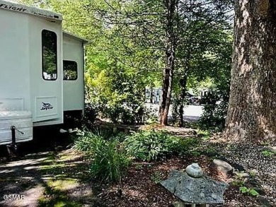 Enjoy a spacious and private RV lot with a lovely patio perfect on Bent Creek Golf Course in Tennessee - for sale on GolfHomes.com, golf home, golf lot