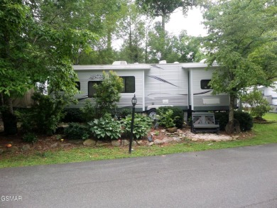 Enjoy a spacious and private RV lot with a lovely patio perfect on Bent Creek Golf Course in Tennessee - for sale on GolfHomes.com, golf home, golf lot