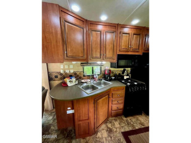 Enjoy a spacious and private RV lot with a lovely patio perfect on Bent Creek Golf Course in Tennessee - for sale on GolfHomes.com, golf home, golf lot