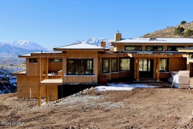 This exceptional new-construction estate, crafted for effortless on Red Ledges Golf Club in Utah - for sale on GolfHomes.com, golf home, golf lot