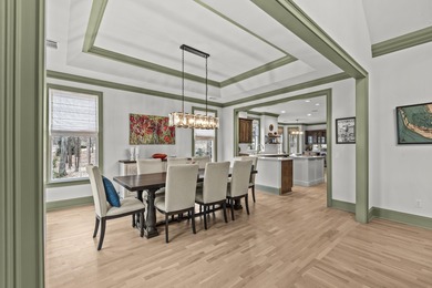 OVERLOOKING THE SIGNATURE 5TH HOLE OF THE JACK NICKLAUS DESIGNED on Great Waters Course At Reynolds Plantation in Georgia - for sale on GolfHomes.com, golf home, golf lot