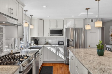 Inviting Cape Cod home designed with entertaining in mind. A on Holly Ridge Golf Club in Massachusetts - for sale on GolfHomes.com, golf home, golf lot