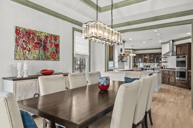 OVERLOOKING THE SIGNATURE 5TH HOLE OF THE JACK NICKLAUS DESIGNED on Great Waters Course At Reynolds Plantation in Georgia - for sale on GolfHomes.com, golf home, golf lot