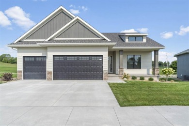 This beautiful Hodge Construction built home overlooks on Saddleback Ridge Golf Course in Iowa - for sale on GolfHomes.com, golf home, golf lot