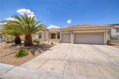 Welcome home to this beautiful Arlington floor plan which offers on Revere Golf Club in Nevada - for sale on GolfHomes.com, golf home, golf lot