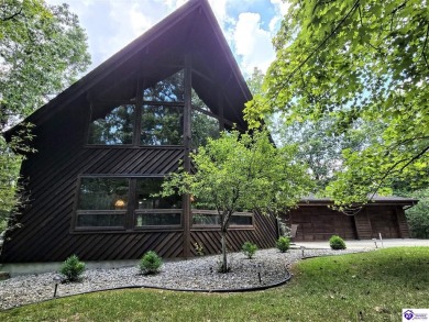 Discover this remarkable Lindal Cedar Home, thoughtfully crafted on Doe Valley Country Club in Kentucky - for sale on GolfHomes.com, golf home, golf lot