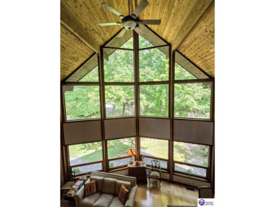 Discover this remarkable Lindal Cedar Home, thoughtfully crafted on Doe Valley Country Club in Kentucky - for sale on GolfHomes.com, golf home, golf lot