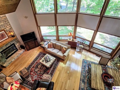 Discover this remarkable Lindal Cedar Home, thoughtfully crafted on Doe Valley Country Club in Kentucky - for sale on GolfHomes.com, golf home, golf lot