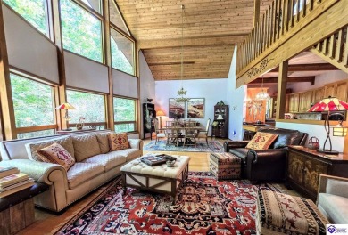 Discover this remarkable Lindal Cedar Home, thoughtfully crafted on Doe Valley Country Club in Kentucky - for sale on GolfHomes.com, golf home, golf lot