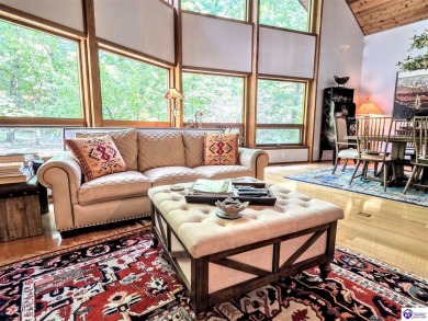 Discover this remarkable Lindal Cedar Home, thoughtfully crafted on Doe Valley Country Club in Kentucky - for sale on GolfHomes.com, golf home, golf lot
