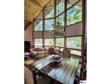 Discover this remarkable Lindal Cedar Home, thoughtfully crafted on Doe Valley Country Club in Kentucky - for sale on GolfHomes.com, golf home, golf lot