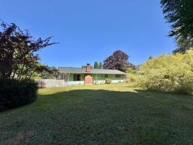 Charming Hiouchi Home Across from the Golf Course. Located at on Del Norte Golf Club in California - for sale on GolfHomes.com, golf home, golf lot