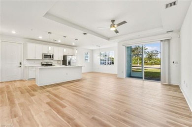 This beautifully situated FIRST FLOOR END unit carriage home in on Highland Woods Golf and Country Club in Florida - for sale on GolfHomes.com, golf home, golf lot