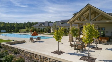 Nestled in the sought-after Legacy at Jordan Lake community on The Preserve At Jordan Lake Golf Club in North Carolina - for sale on GolfHomes.com, golf home, golf lot